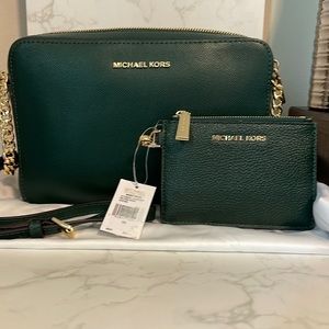 New, Michael Kors crossbody bag. Comes with Wallet.